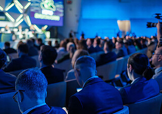 Konferenzteilnehmende